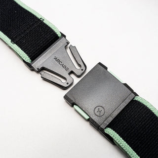 Arcade Carto Stretch Belt in Black Mint, recycled REPREVE polyester, contoured buckle, stretch fit, travel-friendly design.