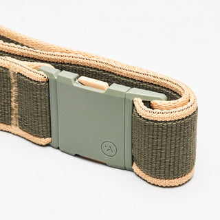 Arcade Carto Stretch Belt in Ivy Green Sandwith subtle color accents, contoured buckle, and REPREVE®️ recycled material.