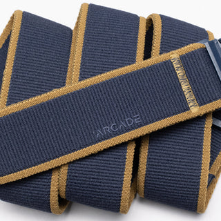 Arcade Carto Stretch Belt in Navy Tumbleweed with subtle color accents, contoured buckle, and REPREVE®️ recycled material.