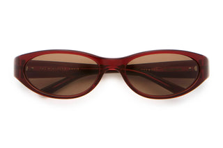 Crap Eyewear Mini Funk Sunglasses in Crystal Black Cherry Bio/Desert — undersized wraparound, bioacetate frames, CR-39 lenses, 100% UV protection, 5 barrel hinges