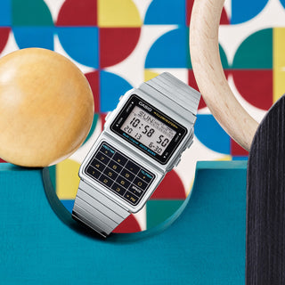 Silver Casio DBC611-1VT watch featuring a calculator, databank, and silver band.