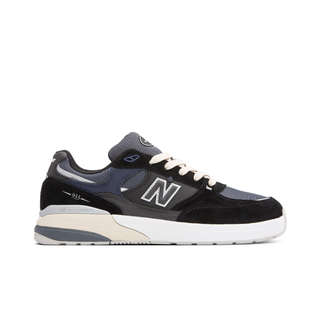 Black and blue New Balance Numeric 933 Andrew Reynolds skate shoe with classic running-inspired shape and cushioned midsole.
