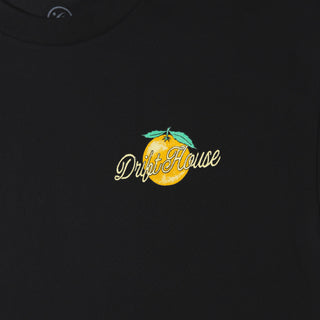 Drift House Fresh Squeezed Tee in Black — Florida orange front graphic and "Fresh Squeezed Threads" Cocoa Beach back print on a 100% combed cotton regular fit tee