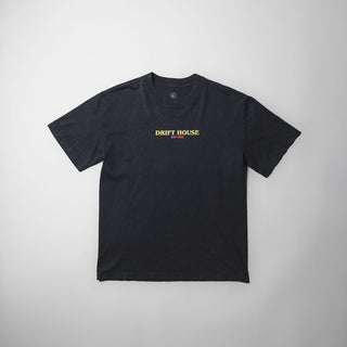 Drift House Good People Tee in stone washed black with skull graphic in pink and yellow.