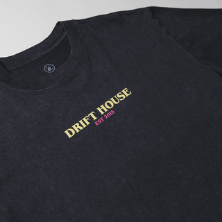 Drift House Good People Tee in stone washed black with skull graphic in pink and yellow.