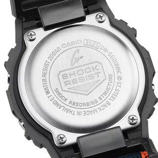 G-SHOCK DW5600MNC8A2 digital watch with gray bio-based resin case, stretch cloth band, and colorful accent details.
