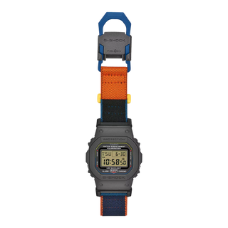 G-SHOCK DW5600MNC8A2 digital watch with gray bio-based resin case, stretch cloth band, and colorful accent details.