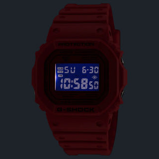 Red G-Shock DW5600RRB-4 digital watch with square case, matching red band and bezel, and black display accents.