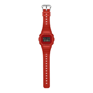 Red G-Shock DW5600RRB-4 digital watch with square case, matching red band and bezel, and black display accents.