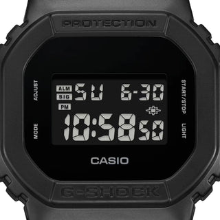 Black Casio G-Shock digital watch on a white background