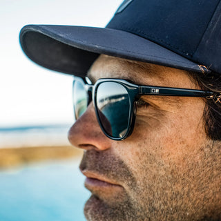 "Otis Eyewear Divide sunglasses in Eco Black frame with Grey Polar lenses — sustainable polarized sunglasses for men and women"