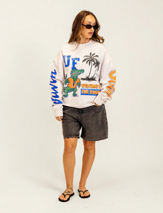 Duvin x Florida Gators Crew Fleece in Grey with UF lettering, Albert the Gator, palm trees, “Welcome to the Swamp” graphics, and sleeve lettering.