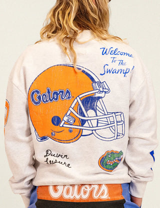 Duvin x Florida Gators Crew Fleece in Grey with UF lettering, Albert the Gator, palm trees, “Welcome to the Swamp” graphics, and sleeve lettering.