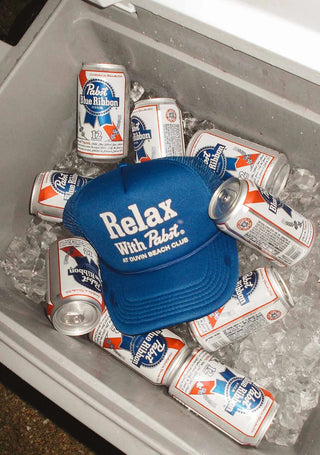 Duvin x PBR blue foam trucker hat; limited collaboration with mesh front.