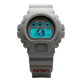 DW6900NASA237 G-SHOCK watch - An Era Defining Mission: Matte white, NASA logo on bands, Earth engraving on case back, American flag on band loop.
