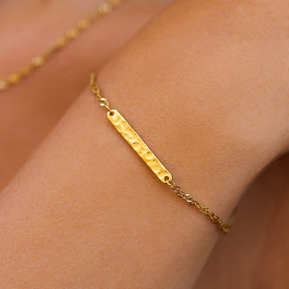 ALCO Sloan bracelet in 18K gold-plated stainless steel with lobster clasp, 6 inch length, and 2 inch extender.