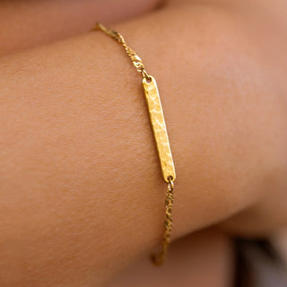 ALCO Sloan bracelet in 18K gold-plated stainless steel with lobster clasp, 6 inch length, and 2 inch extender.