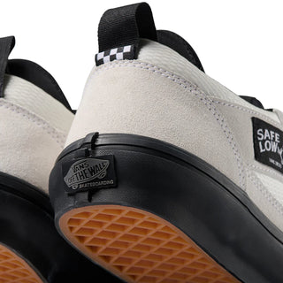 Vans Skate Safe Low Atiba in bone white and black with suede upper, PopCush cushioning, and DuraCap reinforcements.