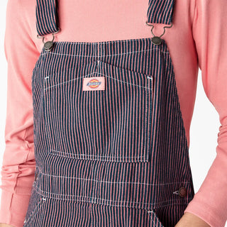 Women's Dickies hickory stripe bib overalls with adjustable straps and pockets.