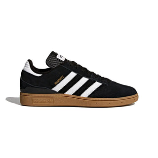 Black Adidas sneaker with white stripes on a white background