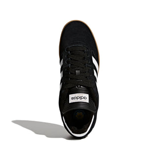 Black Adidas sneaker with white stripes on a white background