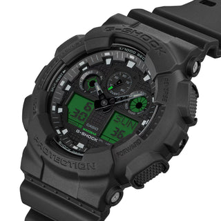 G-SHOCK GA100BEG-1A analog-digital watch with black resin case, electro green accents, and oversized dial.