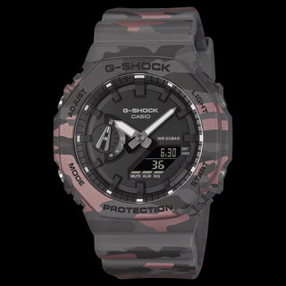 Casio G-Shock GA2100CM-8A camo watch with metallic camouflage pattern and octagonal case design.
