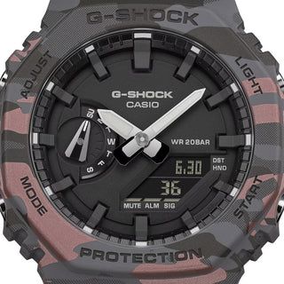 Casio G-Shock GA2100CM-8A camo watch with metallic camouflage pattern and octagonal case design.
