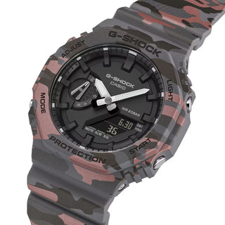 Casio G-Shock GA2100CM-8A camo watch with metallic camouflage pattern and octagonal case design.
