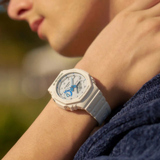 Person wearing a Casio G-Shock watch outdoors