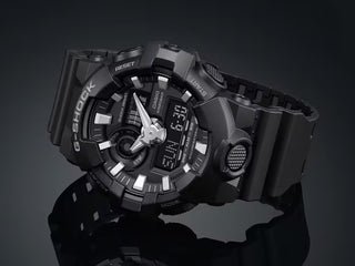 G-SHOCK GA700-1B black analog-digital watch with 3D face and bold hands.
