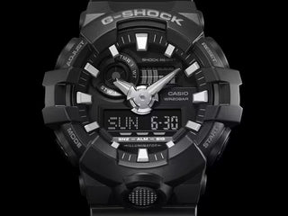 G-SHOCK GA700-1B black analog-digital watch with 3D face and bold hands.