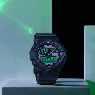 G-SHOCK GA700BEG-1A analog-digital watch with black resin case, electro green accents, and oversized dial.