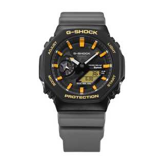 Black and orange G-Shock GAB2100DF-1A watch with Galápagos-inspired details, octagonal case, and bold yellow accents.