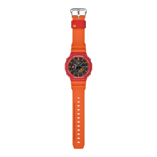 Black and red-orange G-Shock GAB2100DF-4A watch with crab-inspired accents, octagonal case, and Galápagos island dial graphic.