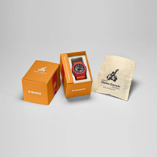 Black and red-orange G-Shock GAB2100DF-4A watch with crab-inspired accents, octagonal case, and Galápagos island dial graphic.