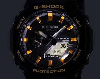 Black and orange G-Shock GAB2100DF-1A watch with Galápagos-inspired details, octagonal case, and bold yellow accents.