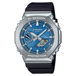 G-Shock GBM2100A-2B watch with blue dial, metal bezel, Tough Solar power, and Smartphone Link technology.