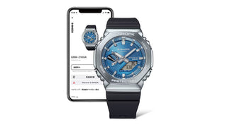 G-Shock GBM2100A-2B watch with blue dial, metal bezel, Tough Solar power, and Smartphone Link technology.