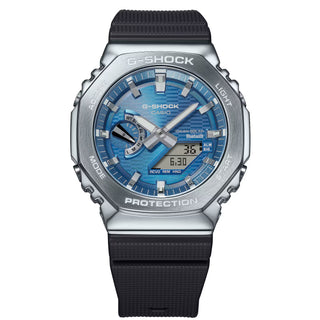 G-Shock GBM2100A-2B watch with blue dial, metal bezel, Tough Solar power, and Smartphone Link technology.