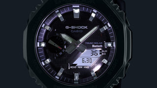 G-Shock GBM2100A-2B watch with blue dial, metal bezel, Tough Solar power, and Smartphone Link technology.