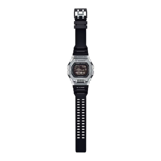 Black digital watch with clear face on a white background