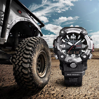 G-SHOCK GGB100XM-1A MUDMASTER watch with silvery stainless-steel honing finish bezel, bio-based carbon fiber-reinforced case, bio-based resin band, and Master of G design for extreme environments