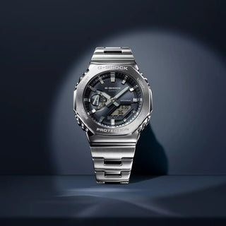Silver Casio G-Shock watch on a dark background