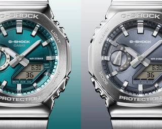 Two Casio G-Shock watches side by side on a gradient background