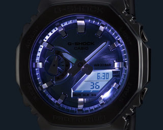 G-Shock Casio watch with blue digital display on a dark background