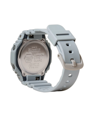 G-SHOCK GMAS2100NC8A analog-digital watch in grey and light purple, with bio-based resin band and basil leaf indicator.
