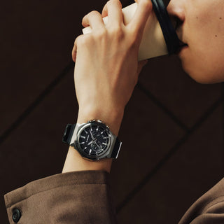 G-SHOCK GSTB1000-1A with a silver-tone metal bezel, black brick-pattern dial, silver-tone hands and markers, and black band