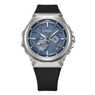 G-SHOCK GSTB1000-2A with a silver-tone metal bezel, blue brick-pattern dial, silver-tone hands and markers, and black band