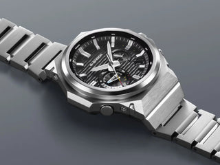 G-SHOCK GSTB1000D-1A watch with solid stainless steel band and bezel, Bluetooth connectivity, Tough Solar power, Carbon Core Guard, minimalist design, and multi-finish construction